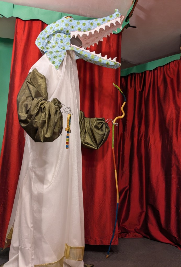 full view of Sobek and staff